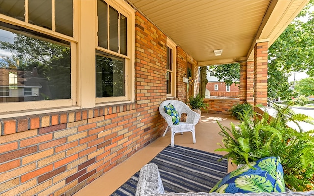 view of patio featuring a porch