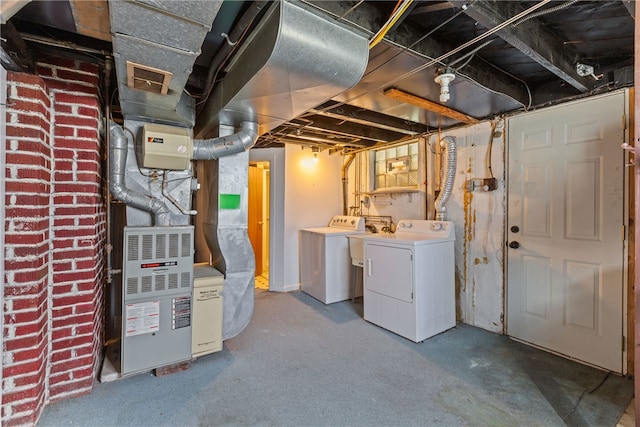 basement featuring washer and clothes dryer