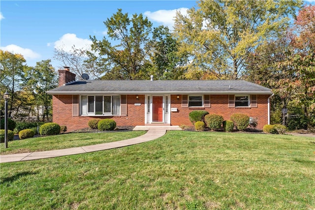 ranch-style home with a front yard