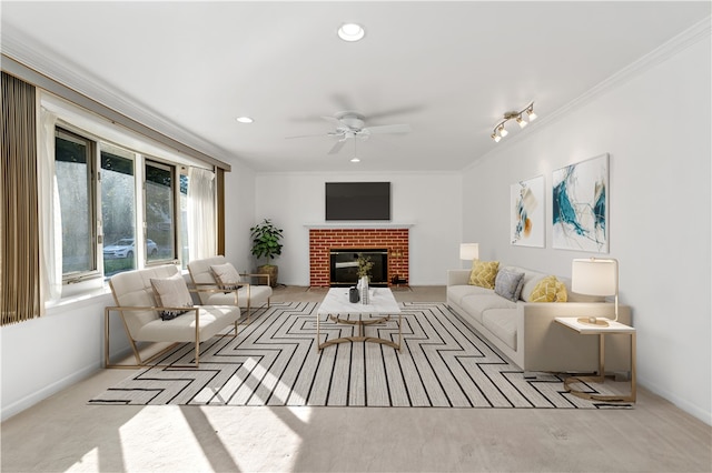 living room with light carpet, crown molding, a brick fireplace, and ceiling fan