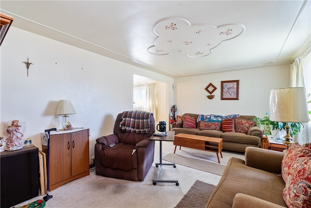 living room featuring light colored carpet