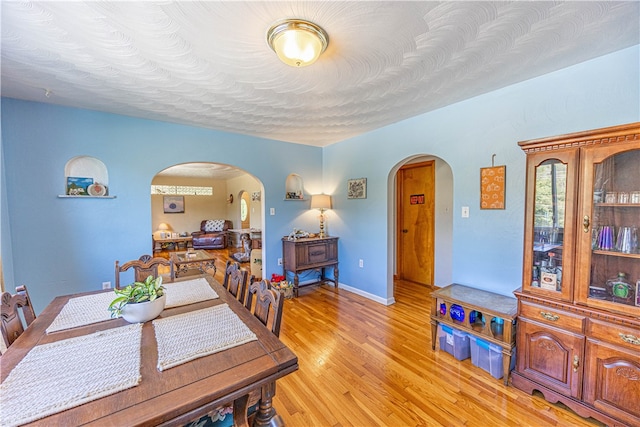 dining space featuring light hardwood / wood-style floors