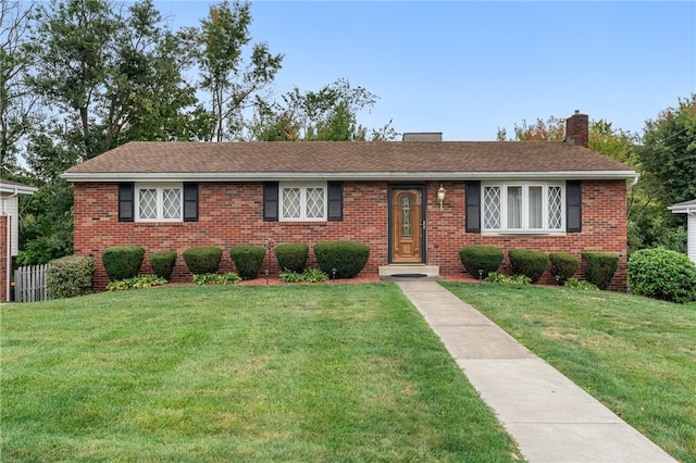 single story home with a front yard