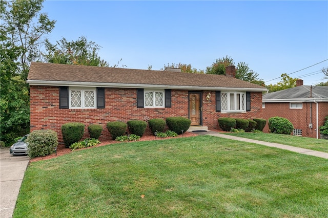 view of front of house with a front lawn