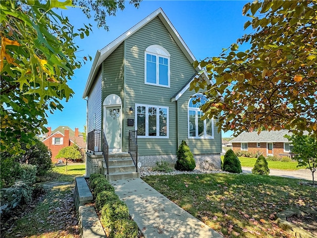 view of property with a front lawn