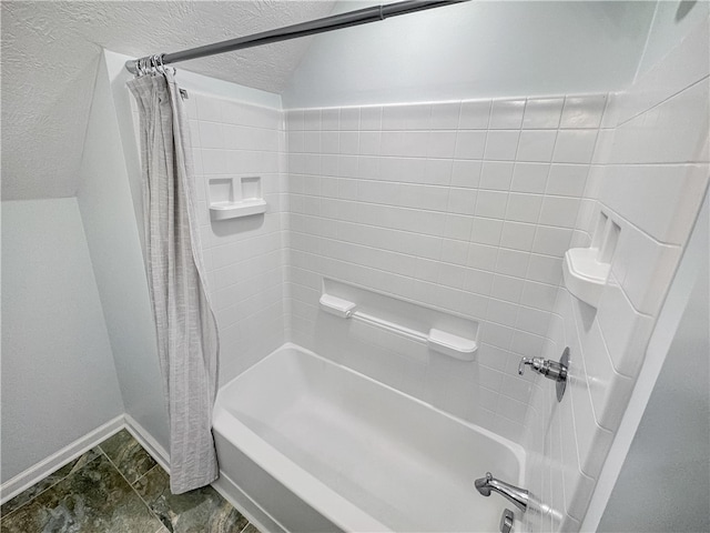 bathroom featuring shower / bathtub combination with curtain