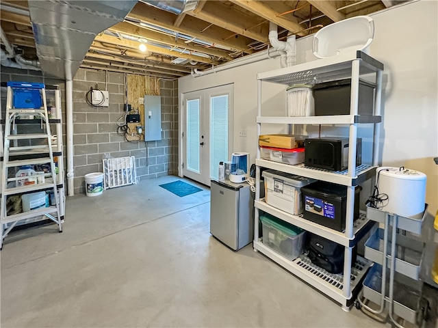 basement featuring electric panel