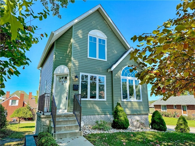 front of property featuring a front lawn