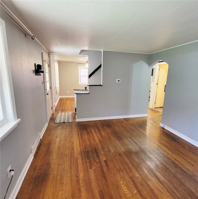 unfurnished living room with hardwood / wood-style floors