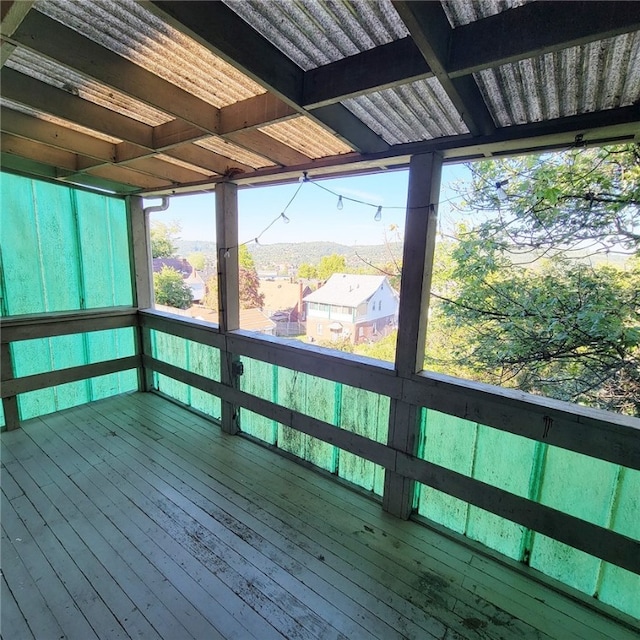 wooden deck featuring a mountain view