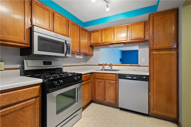 kitchen with appliances with stainless steel finishes and sink