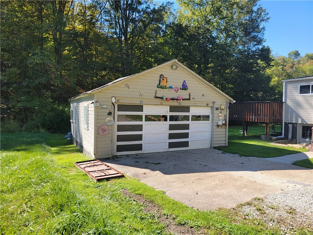 garage with a yard