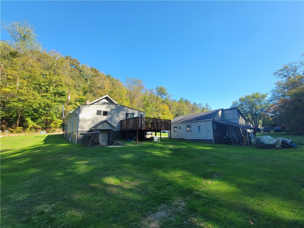 view of yard featuring a deck