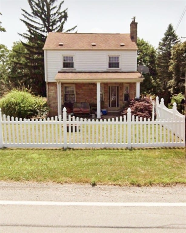 view of front of home featuring covered porch