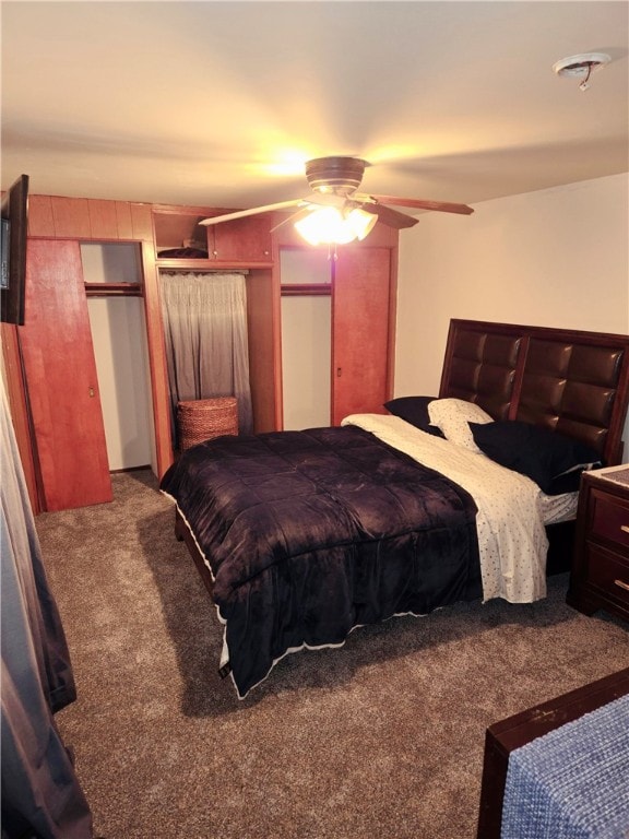 bedroom with ceiling fan and carpet floors