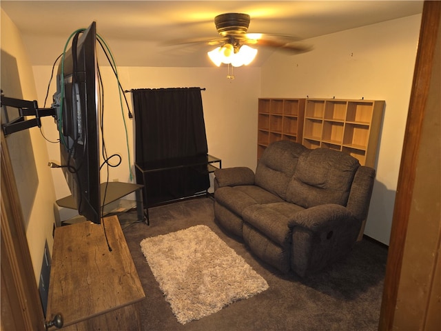 carpeted living room featuring ceiling fan