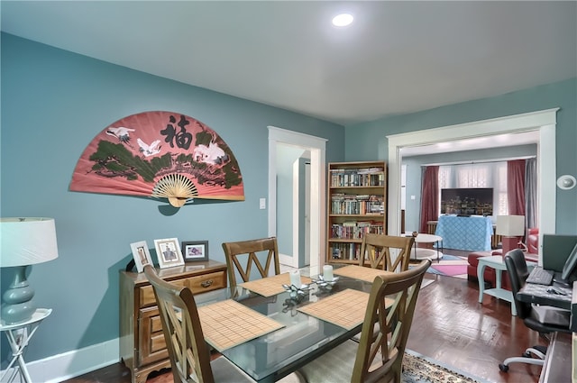 dining space featuring hardwood / wood-style flooring