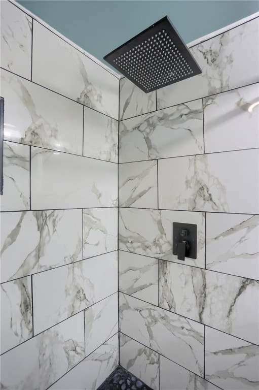 room details with a tile shower