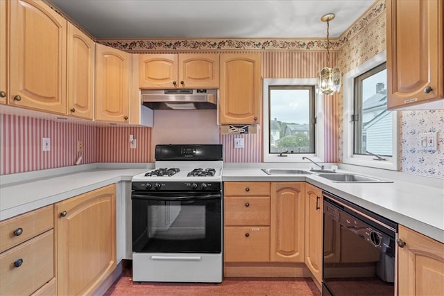 kitchen featuring light brown cabinets, hanging light fixtures, sink, dishwasher, and white range with gas stovetop