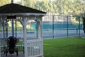 view of property's community with a gazebo and a lawn