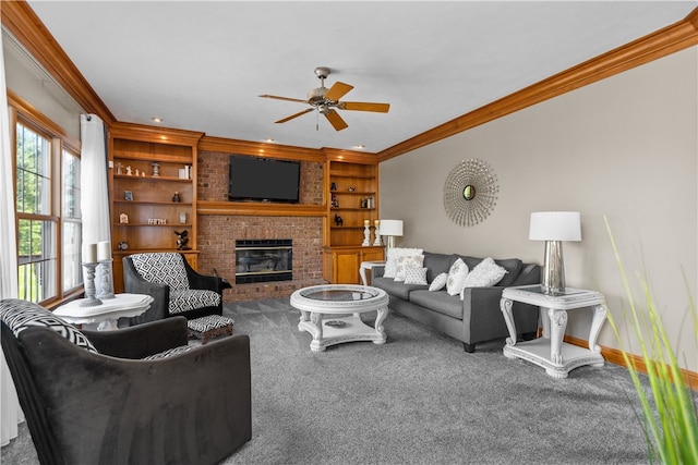 living room with ornamental molding, a brick fireplace, ceiling fan, and carpet flooring