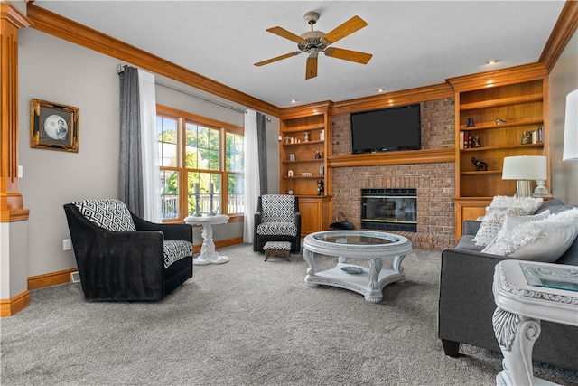 living room featuring carpet, crown molding, ceiling fan, and a brick fireplace