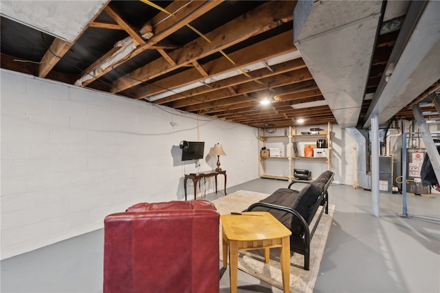 basement featuring water heater and heating unit