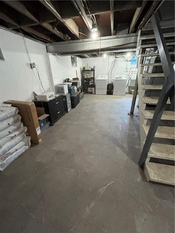 basement with washing machine and dryer