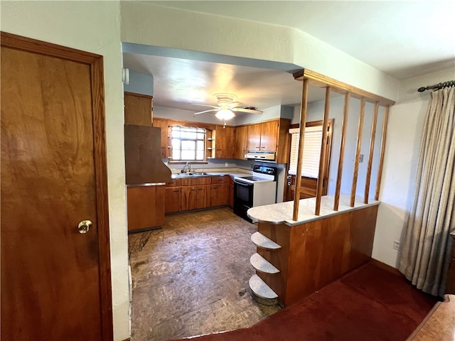 kitchen featuring ceiling fan, sink, kitchen peninsula, exhaust hood, and white range with electric cooktop