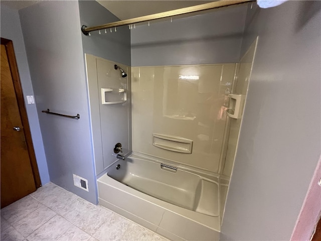 bathroom with washtub / shower combination