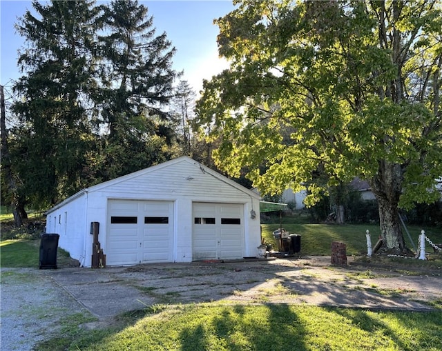 garage with a yard