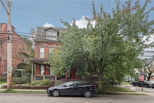 5972 Alder St, Shadyside, PA 15232 - second empire-style home featuring brick siding, mansard roof, and a porch