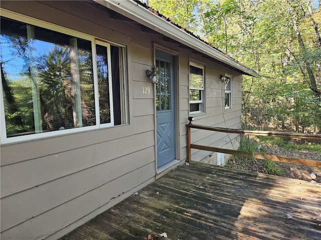 doorway to property with a wooden deck