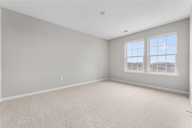 unfurnished room with carpet