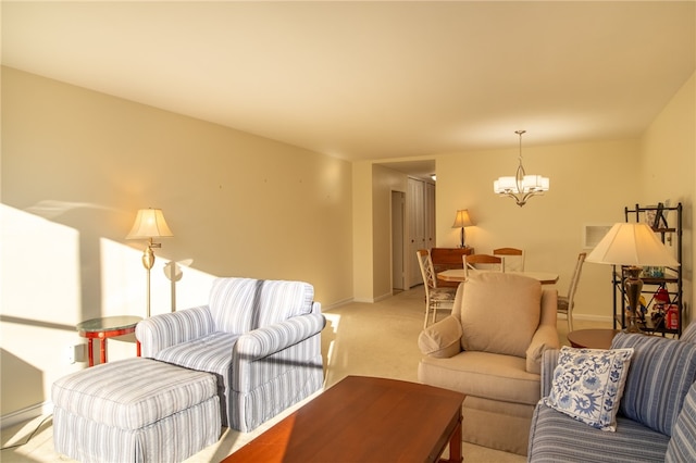 living room featuring light colored carpet and an inviting chandelier