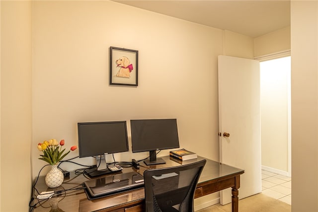 office space with light tile patterned flooring