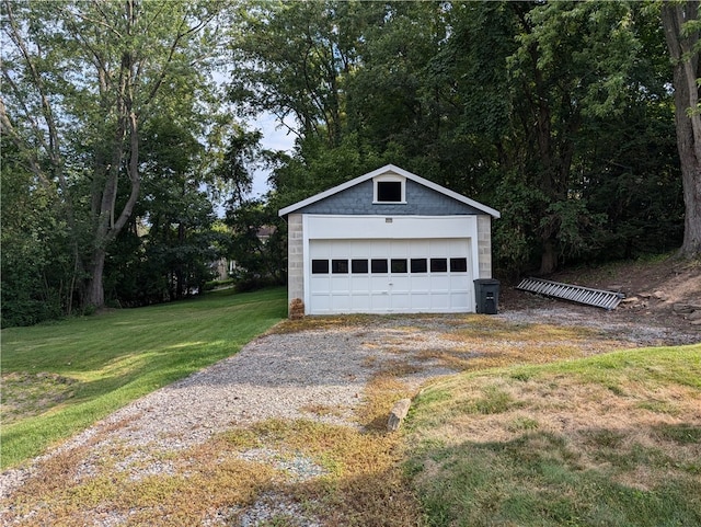 garage with a lawn