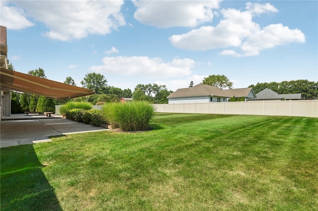 view of yard with a patio area