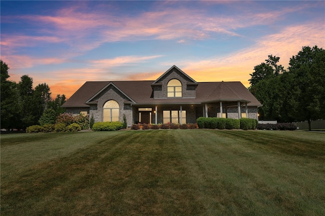 view of front of home featuring a yard