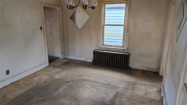 unfurnished room featuring radiator heating unit