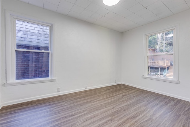 empty room featuring hardwood / wood-style floors