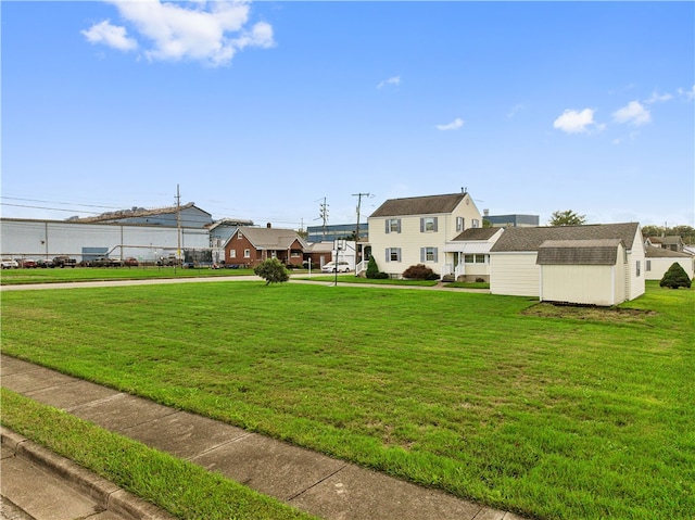 view of yard with a storage unit