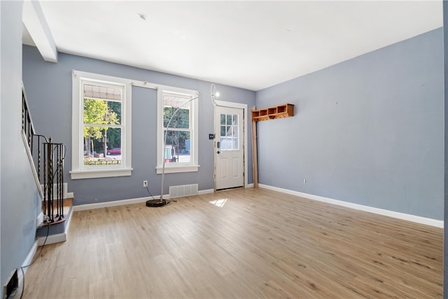 entryway with light hardwood / wood-style flooring