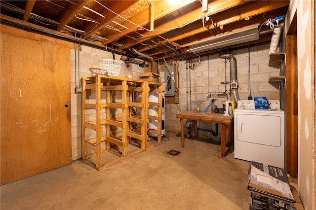 basement featuring washer / dryer and electric panel