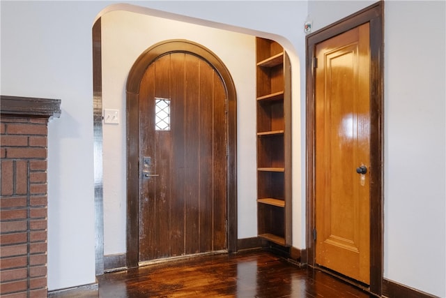 foyer featuring dark hardwood / wood-style floors