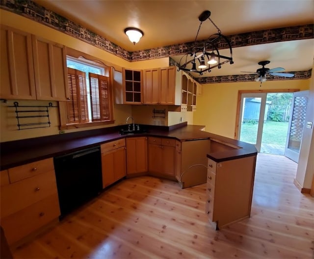 kitchen featuring light hardwood / wood-style floors, black dishwasher, ceiling fan, and kitchen peninsula