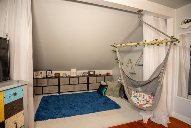 bedroom with wood-type flooring