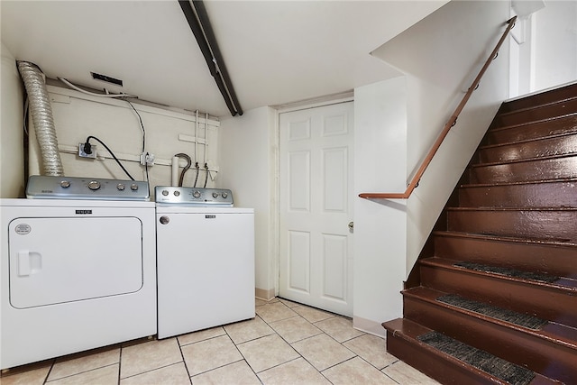 laundry room with washing machine and dryer