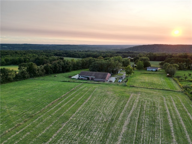 aerial view at dusk with a rural view