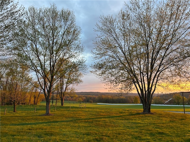 surrounding community with a lawn